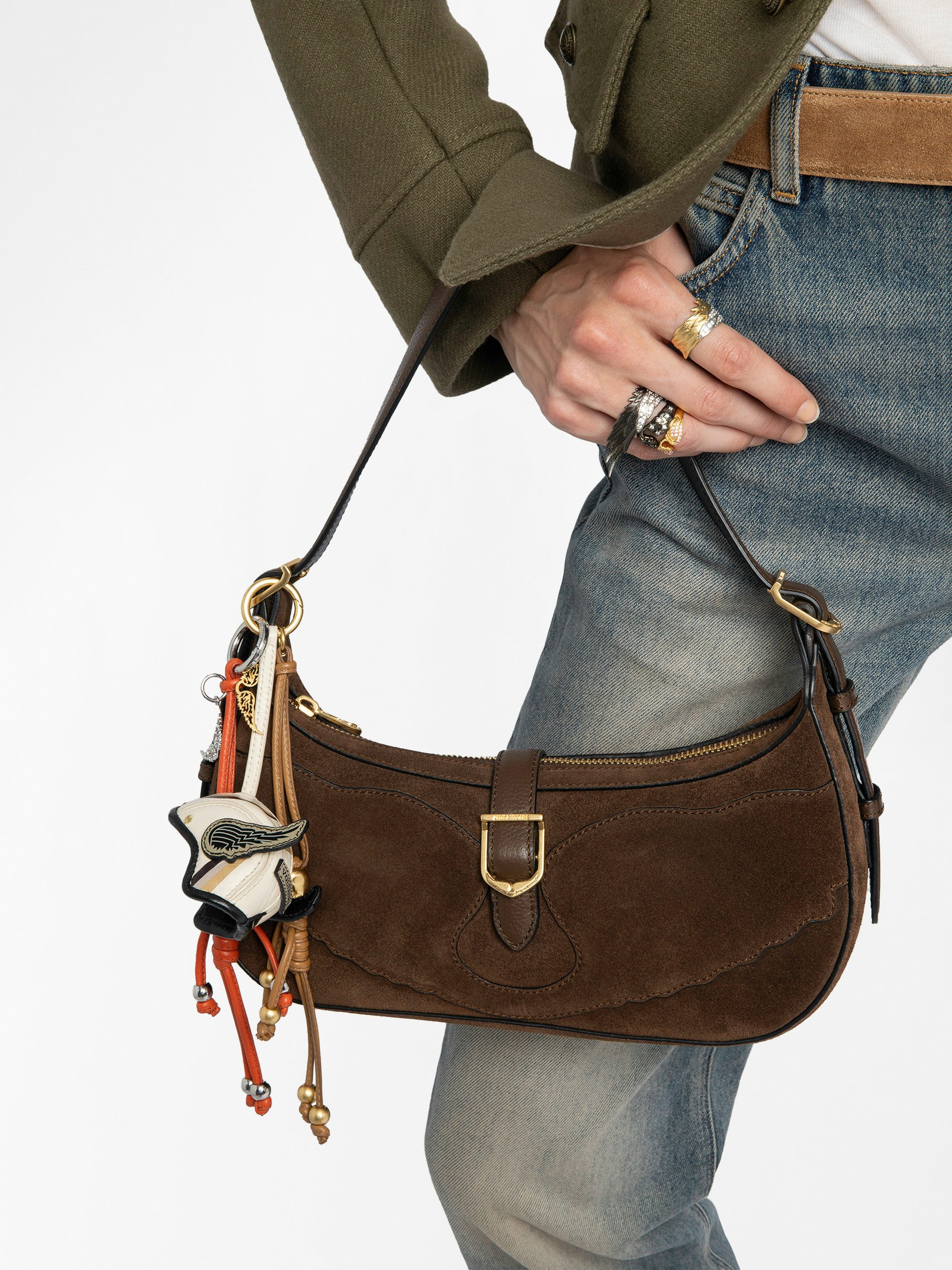 Moonrise Bag - Baguette bag in suede with leather handle and signature wings.